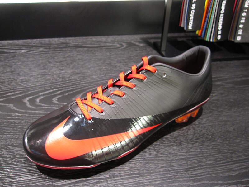 Nike Mercurial Vapor Superfly I (2009) — customised Black/Orange pair. The first Superfly, with a carbon-fibre plate and Flywire cables.